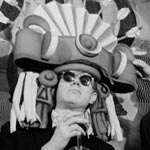 Andy wearing an Inca headdress with Salvador Dali at the St. Regis Hotel, NYC, winter, 1964-65