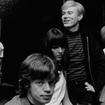 Baby Jane Holzer, Mick Jagger, model Peggy Moffitt, and Andy at Holzer's apartment, NYC, winter 1964-65
